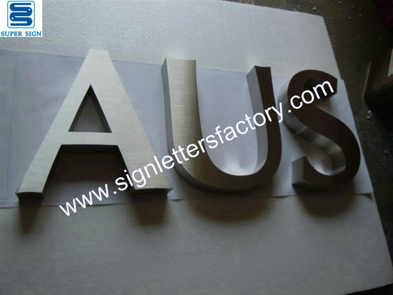 built-up brushed stainless steel letters