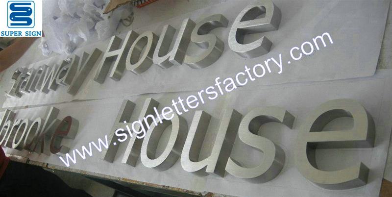 Fabricated brushed stainless steel letter sign Fabricated brushed stainless steel letter sign