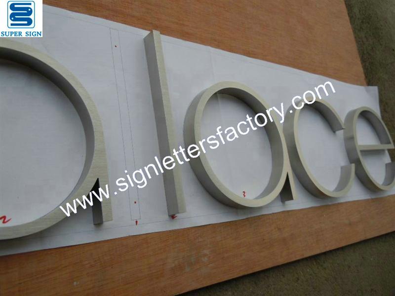 Fabricated brushed stainless steel sign letter