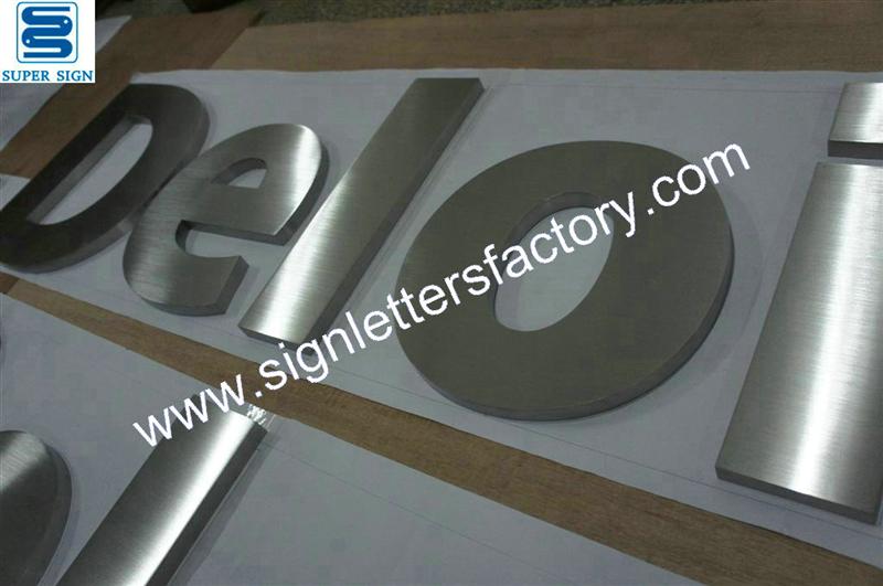built-up brushed stainless steel letter signage