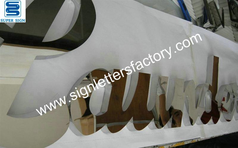 fabricated polished stainless steel text sign fabricated polished stainless steel text sign